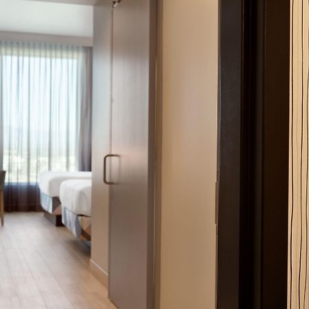 เรดิสัน บลู อนาไฮม์ Hotel ภายนอก รูปภาพ A room at the hotel